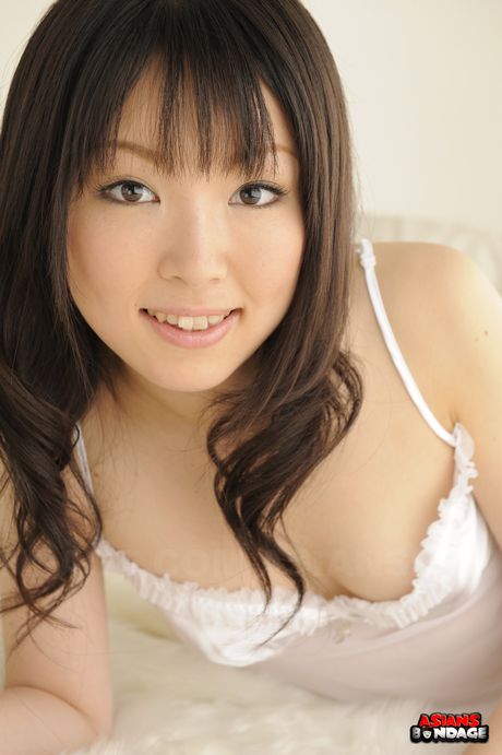 Asian gal Aoi Minami takes off her clothes